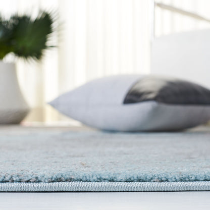 SAFAVIEH Tapis abstrait moderne Glacier Bertille