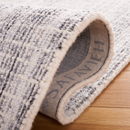 Tapis en laine moderne abstrait fait main SAFAVIEH Maggy