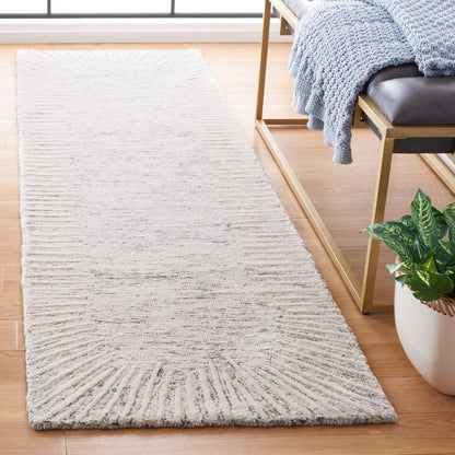 Tapis moderne en laine Sofoula abstrait fait main SAFAVIEH