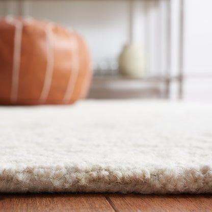 Tapis en laine moderne à motif floral SAFAVIEH fait main Blossom Cateluta