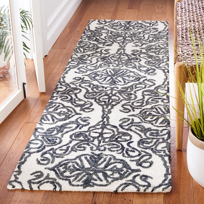 Tapis en laine moderne à motif floral SAFAVIEH fait main Blossom Cateluta