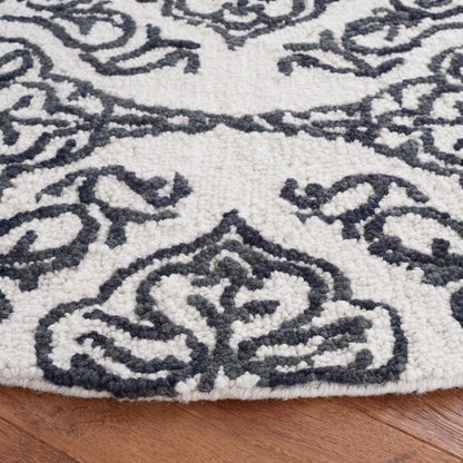 Tapis en laine moderne à motif floral SAFAVIEH fait main Blossom Cateluta