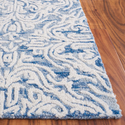 Tapis moderne en laine florale SAFAVIEH fait main Blossom Gertrida