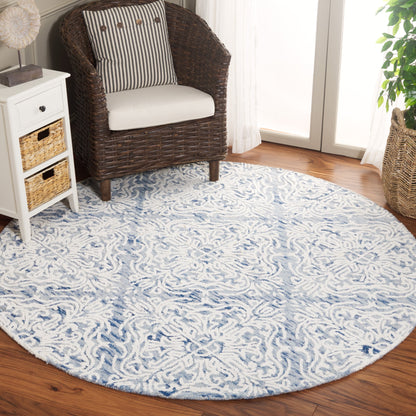 Tapis moderne en laine florale SAFAVIEH fait main Blossom Gertrida