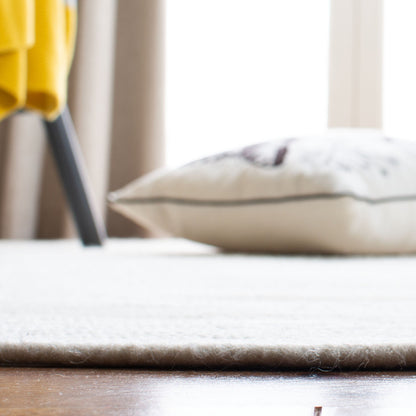 Tapis de campagne en laine tressée à la main SAFAVIEH