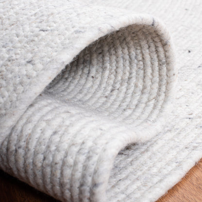 Tapis de campagne en laine tressée à la main SAFAVIEH