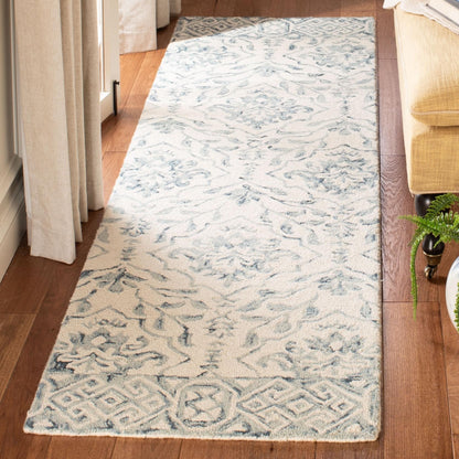 Tapis en laine florale Elvedina fait main SAFAVIEH, teint par immersion