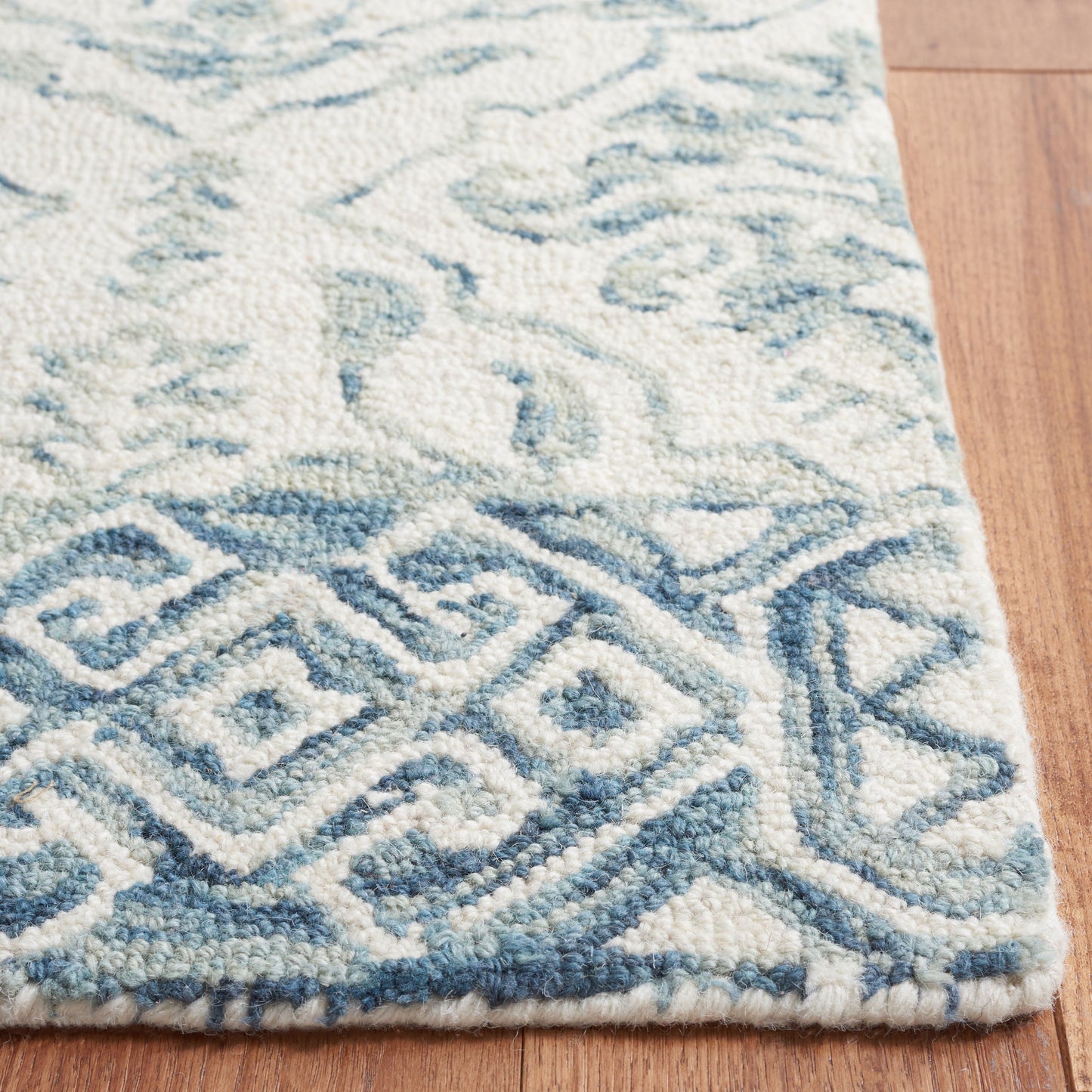 Tapis en laine florale Elvedina fait main SAFAVIEH, teint par immersion