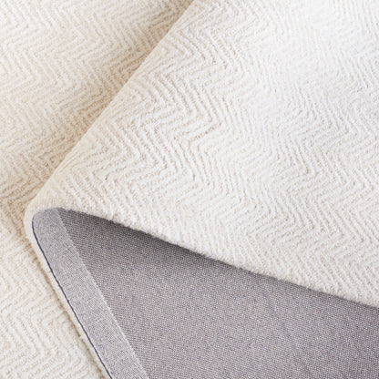 Tapis en viscose à chevrons Glamour Ostilia fait main SAFAVIEH