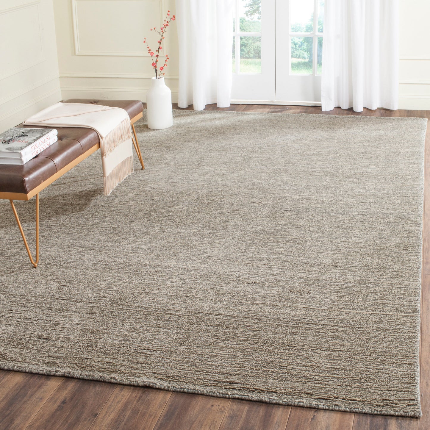 Tapis moderne en laine fait main SAFAVIEH avec bordure en palmier de l'Himalaya