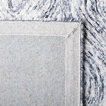 SAFAVIEH Tapis en laine Ikat Lilija fait main