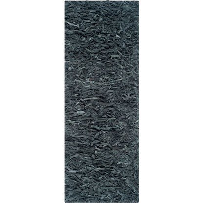 Tapis décoratif moderne SAFAVIEH en cuir shaggy fait main Doinita