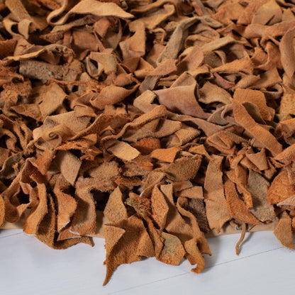 Tapis décoratif moderne SAFAVIEH en cuir shaggy fait main Doinita