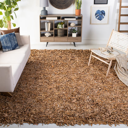 Tapis décoratif moderne SAFAVIEH en cuir shaggy fait main Doinita