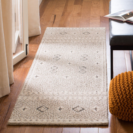 Tapis en laine Lutetia micro-bouclé fait main SAFAVIEH