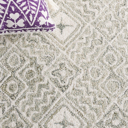 Tapis en laine Lutetia micro-bouclé fait main SAFAVIEH