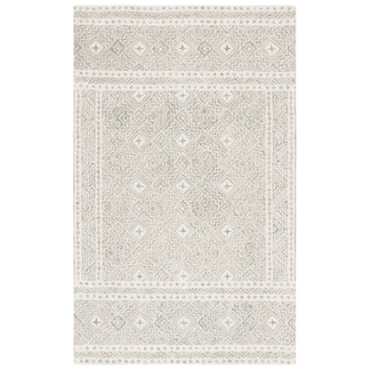 Tapis en laine Lutetia micro-bouclé fait main SAFAVIEH