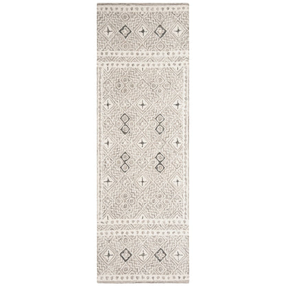 Tapis en laine Lutetia micro-bouclé fait main SAFAVIEH