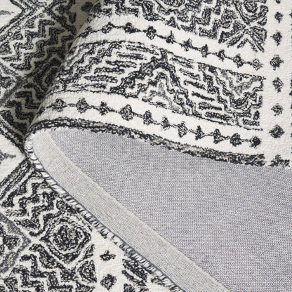 Tapis en laine Lutetia micro-bouclé fait main SAFAVIEH