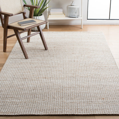 Tapis SAFAVIEH fait main en fibre naturelle Yareli jute et laine.