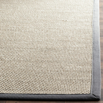Tapis en sisal Lorine à bordure décontractée en fibres naturelles SAFAVIEH