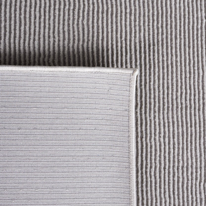 Tapis uni SAFAVIEH Revive Avie