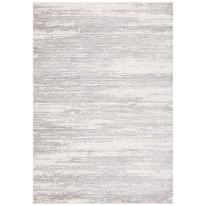 Tapis abstrait moderne SAFAVIEH Skyler Wanne