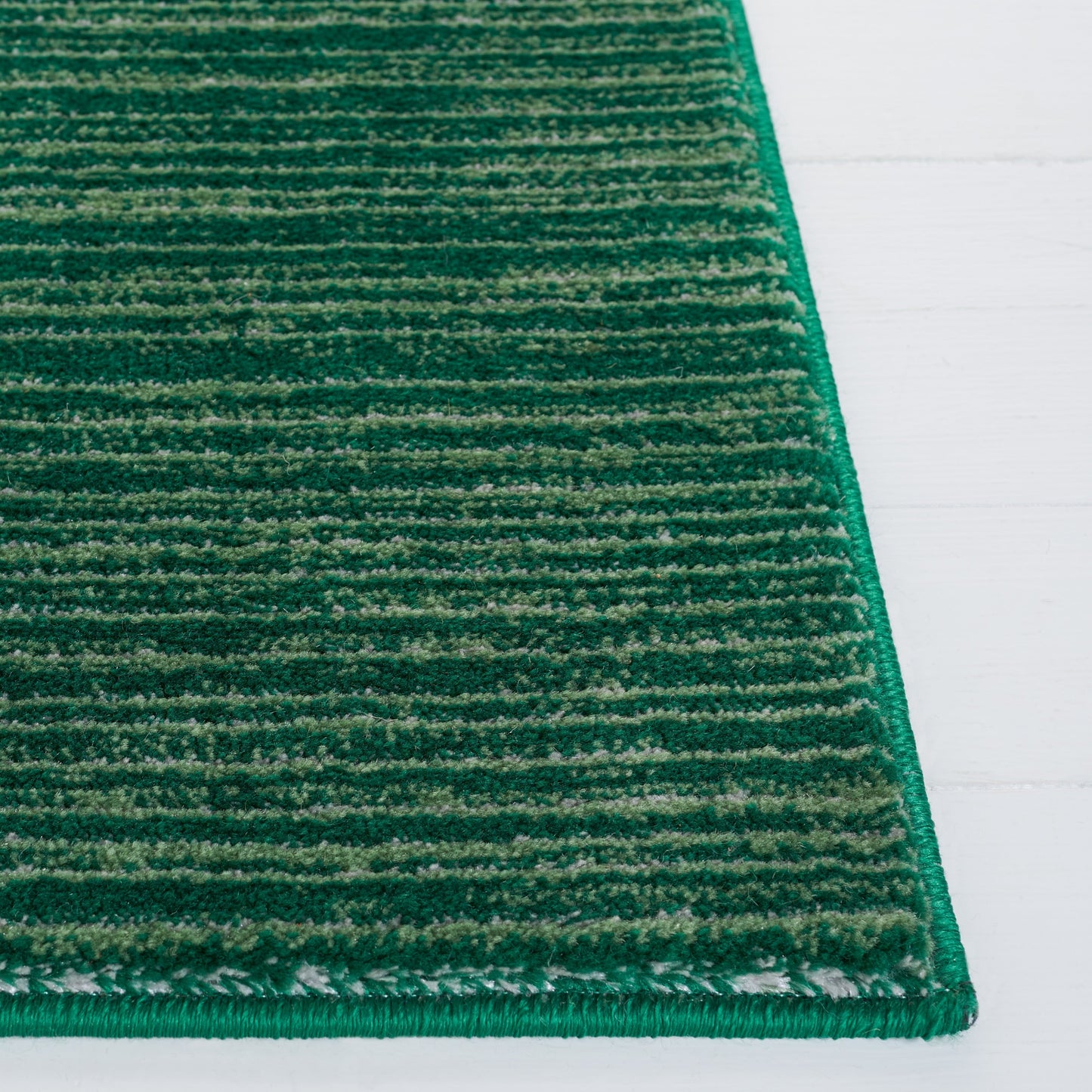 Tapis moderne SAFAVIEH Vision Sunanda aux tons ombrés.