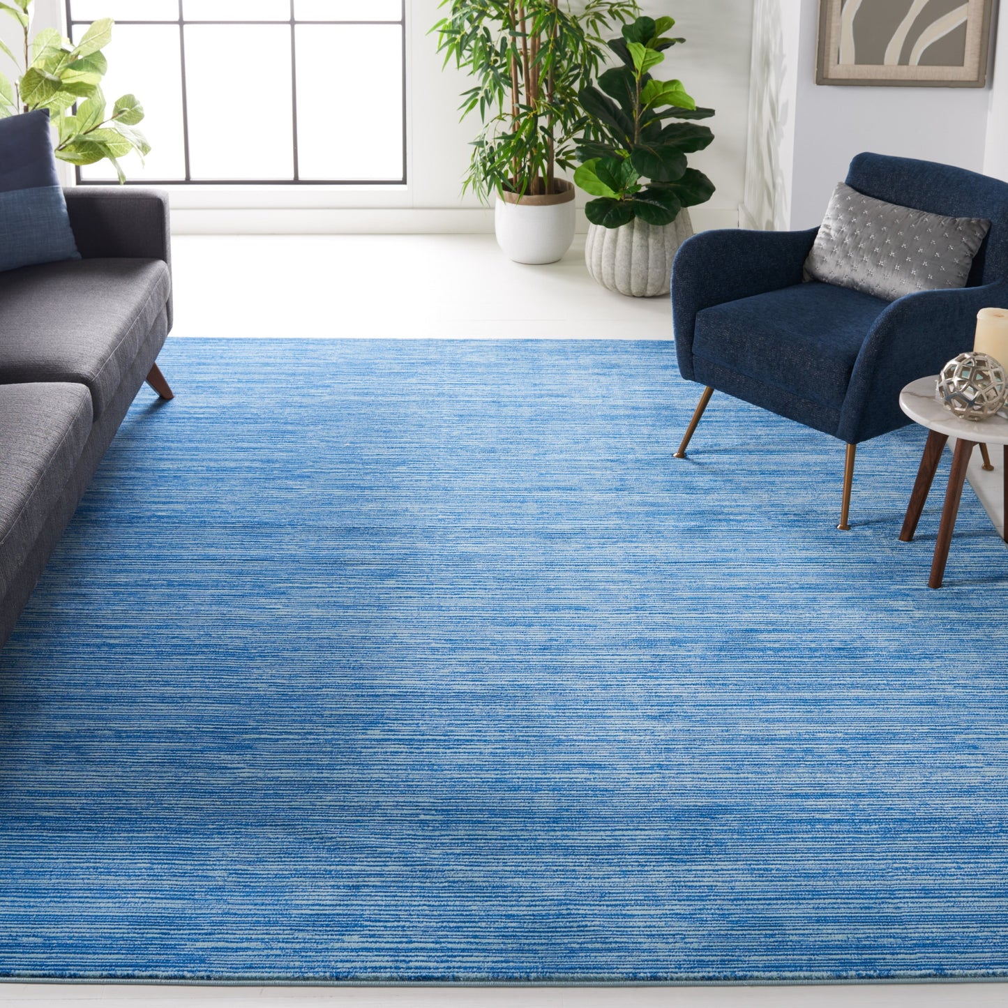 Tapis moderne SAFAVIEH Vision Sunanda aux tons ombrés.