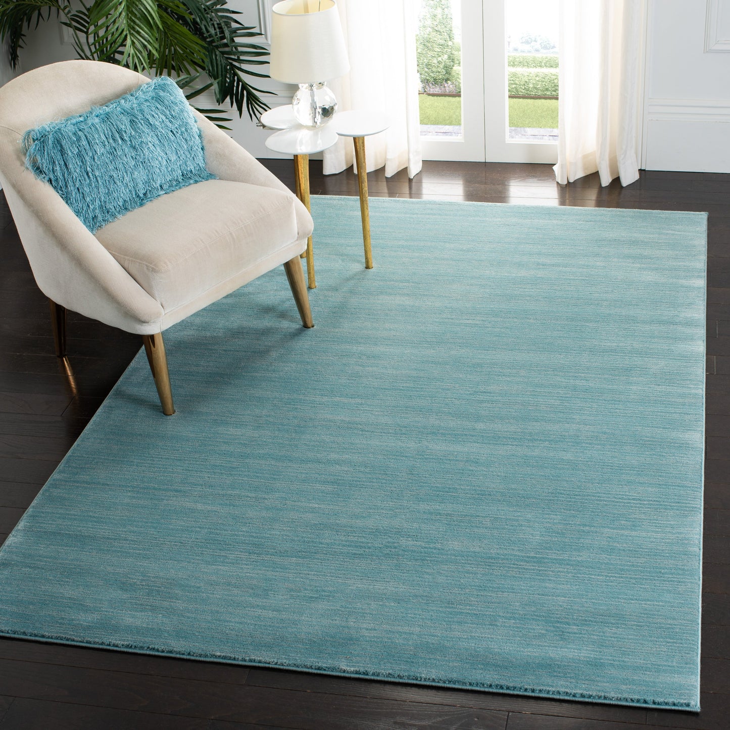 Tapis moderne SAFAVIEH Vision Sunanda aux tons ombrés.
