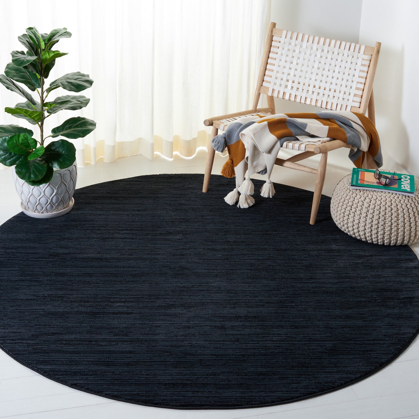 Tapis moderne SAFAVIEH Vision Sunanda aux tons ombrés.
