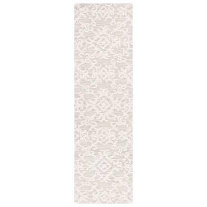 SAFAVIEH, Tapis en laine floral moderne Vesela fait main