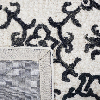 SAFAVIEH, Tapis en laine floral moderne Vesela fait main