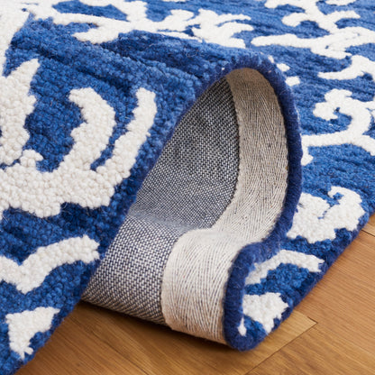 SAFAVIEH, Tapis en laine floral moderne Vesela fait main