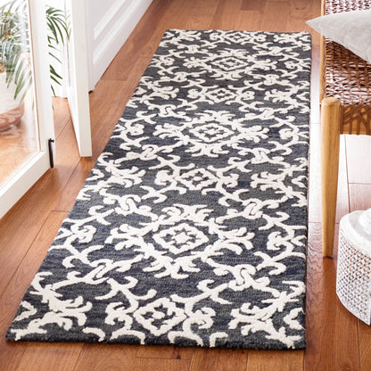 SAFAVIEH, Tapis en laine floral moderne Vesela fait main