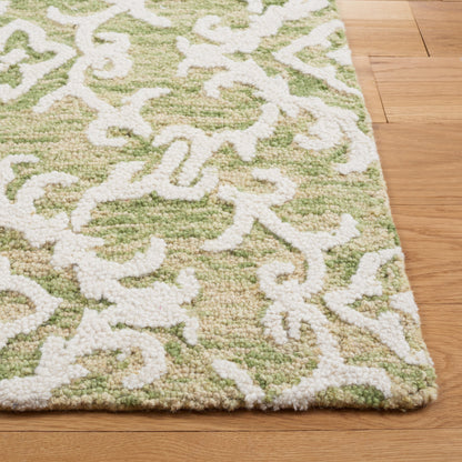 SAFAVIEH, Tapis en laine floral moderne Vesela fait main