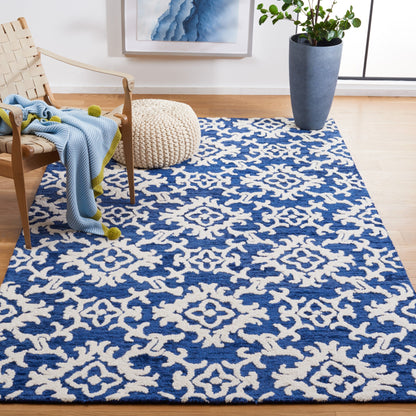 SAFAVIEH, Tapis en laine floral moderne Vesela fait main