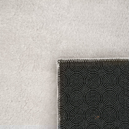 Tapis doux et lavable avec envers antidérapant, couleurs unies