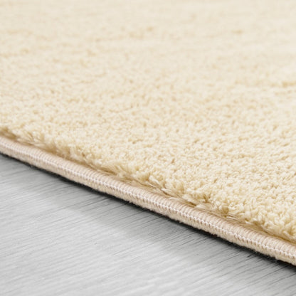 Tapis doux et lavable avec envers antidérapant, couleurs unies