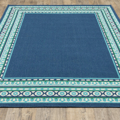 Tapis d'intérieur/extérieur Style Haven Martinque à bordure verte bleu marine ~