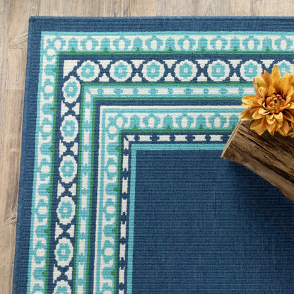 Tapis d'intérieur/extérieur Style Haven Martinque à bordure verte bleu marine ~