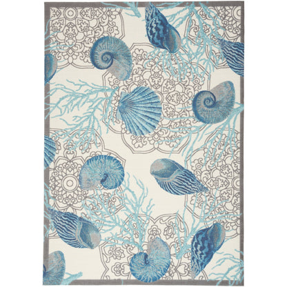 Tapis d'intérieur et d'extérieur Waverly Sun &amp; Shade Shore Thing à motif de coquillages tropicaux et floraux