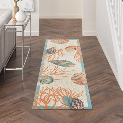 Tapis d'intérieur et d'extérieur Waverly Sun &amp; Shade Shore Thing à motif de coquillages tropicaux et floraux