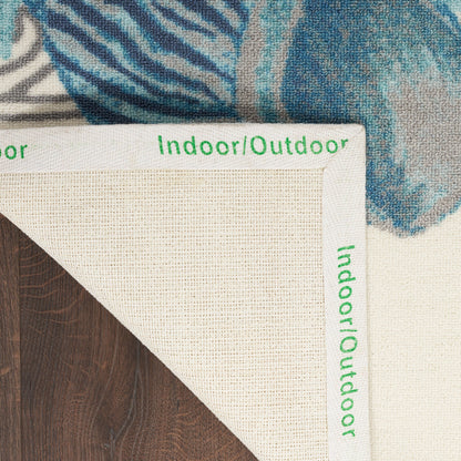 Tapis d'intérieur et d'extérieur Waverly Sun &amp; Shade Shore Thing à motif de coquillages tropicaux et floraux