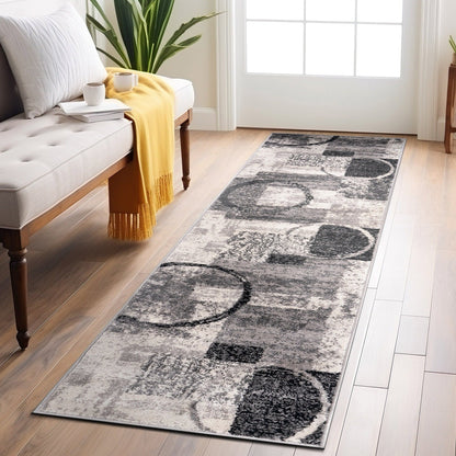 Tapis circulaire abstrait en polypropylène fabriqué à la machine, World Rug Gallery