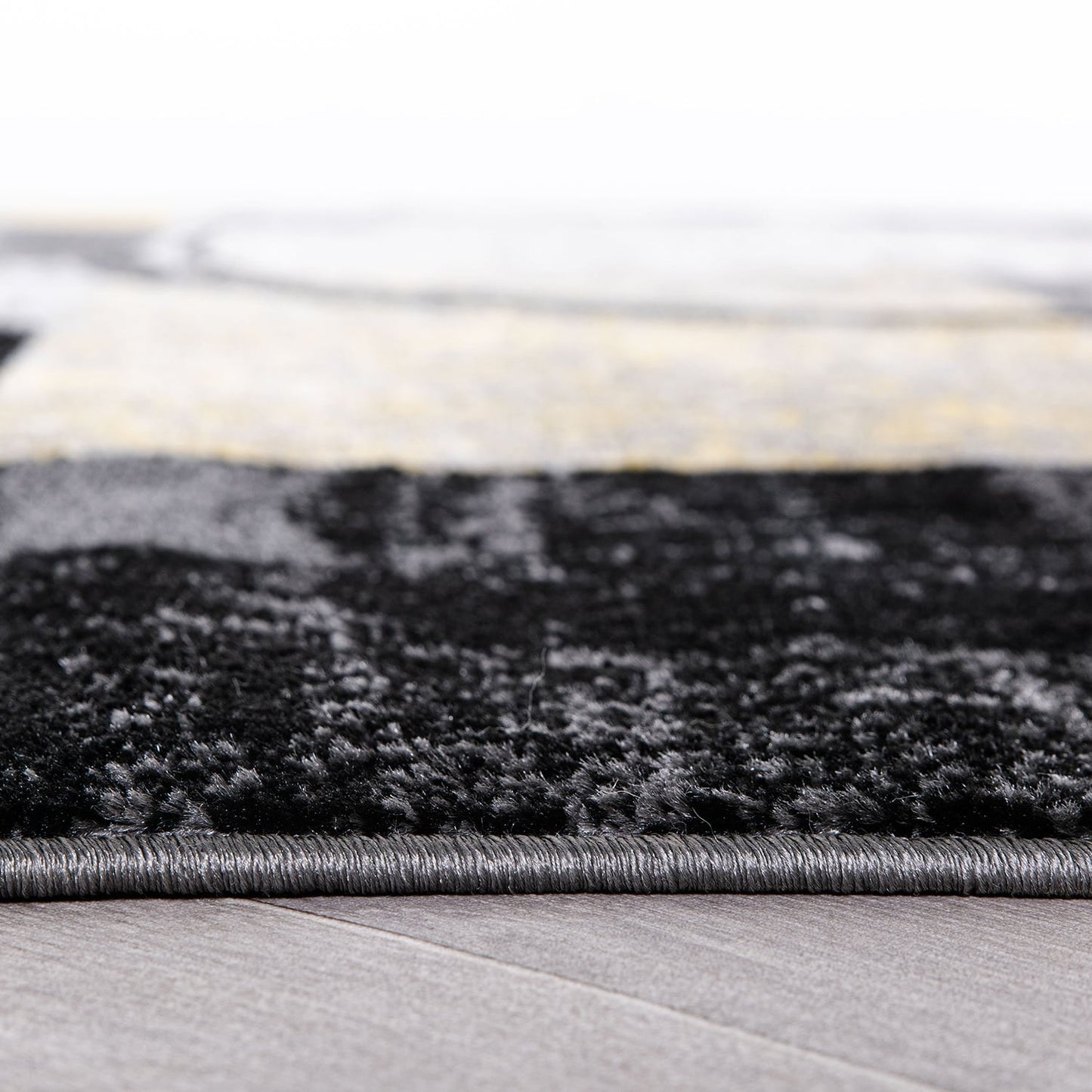 Tapis circulaire abstrait en polypropylène fabriqué à la machine, World Rug Gallery