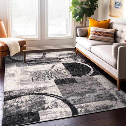 Tapis circulaire abstrait en polypropylène fabriqué à la machine, World Rug Gallery