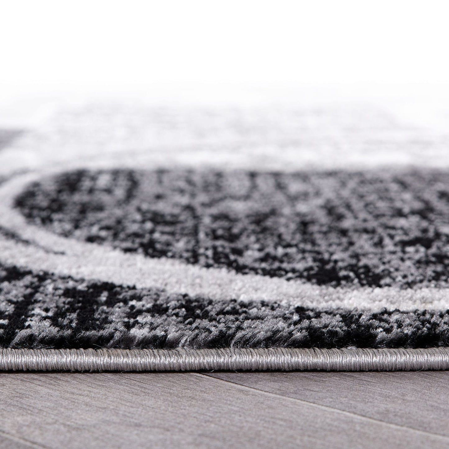 Tapis circulaire abstrait en polypropylène fabriqué à la machine, World Rug Gallery