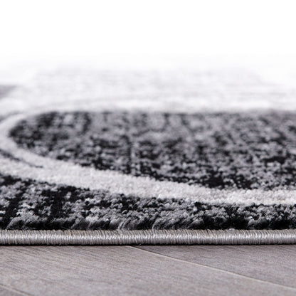 Tapis circulaire abstrait en polypropylène fabriqué à la machine, World Rug Gallery